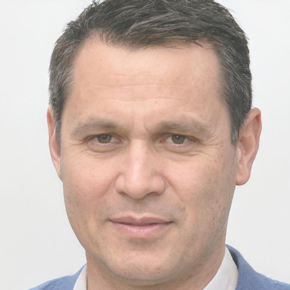 Professional headshot of corporate finance manager